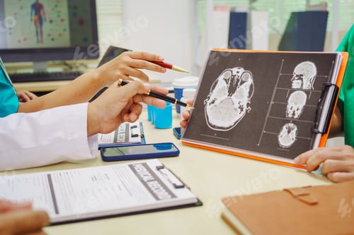 Preview: Three doctors sit together at a hospital desk, discussing bone health topics like osteoarthritis