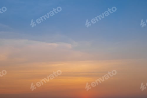Preview: Beautiful orange sunset sky background. Evening sky a bright golden.