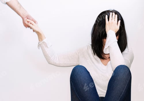 Preview: Woman looking depressed, hand on head and the other hand holding for helping