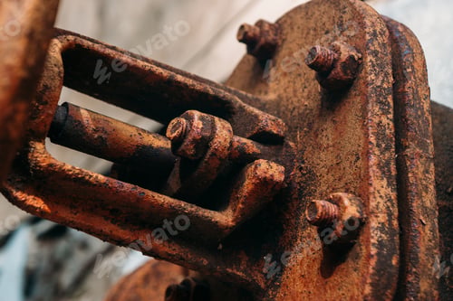 Preview: An Old Rusty Gas Control Valve On The Wall. Industrial Valve In A Large System. Rusty Pipes. Old