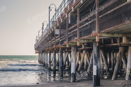Preview: An old wooden pier at Santa Monica beach in sunny California