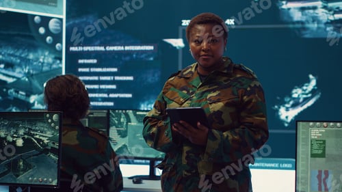 Preview: Woman sergeant major working on deployment of electronic warfare tools