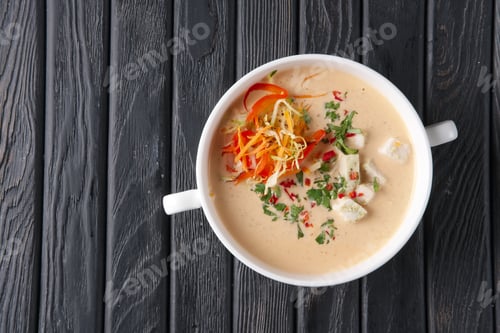 Preview: Top view of chicken soup puree with vegetables