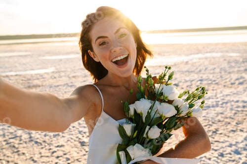 Preview: Cheery optimistic happy young beautiful woman