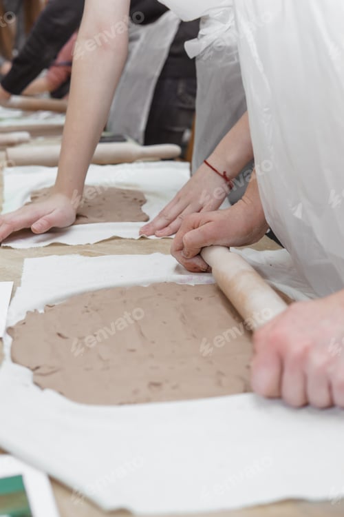 Preview: Women's hands knead clay, drawing elements of the product. Production of ceramic products