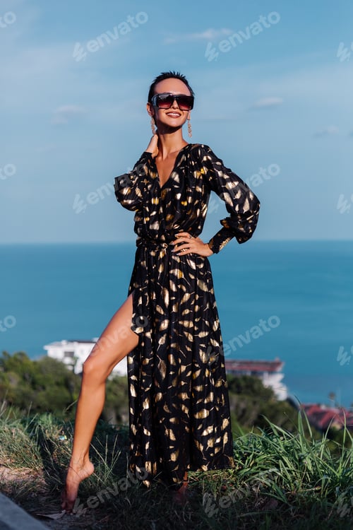 Preview: woman in black golden cape