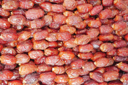 Preview: many date fruits display for sale at local market