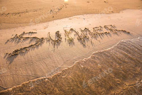 Preview: Summer word written in sand. Summer beach concept