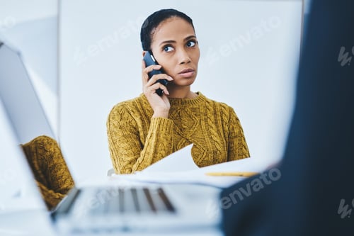 Preview: Experienced woman manager communicate via smartphone gadget
