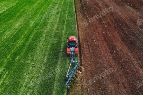 Preview: Aerial View of Tractor Plowing Field