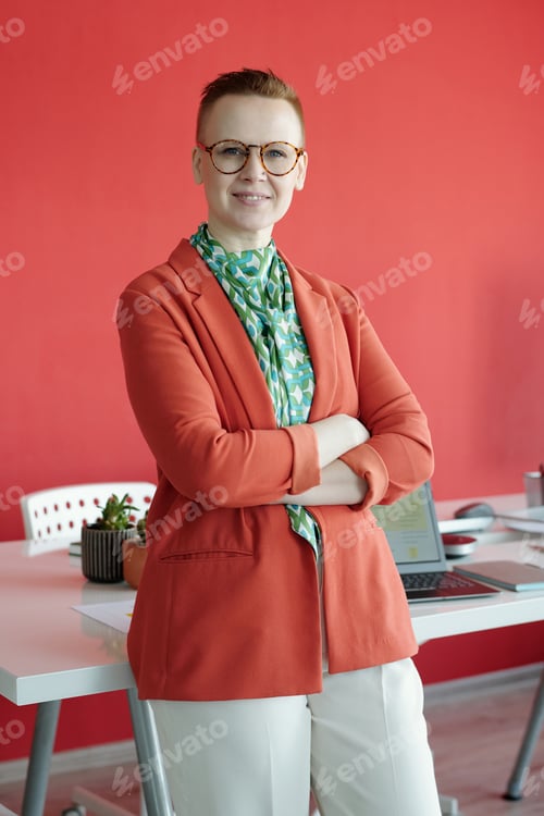 Preview: Portrait Of Businesswoman Smiling In Office Setting