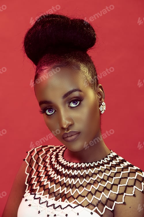 Preview: Portrait of african lady against red background