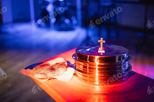 Preview: The process of breaking bread in the modern church.