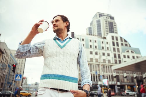Preview: Concentrated male person looking at new buildings