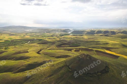 Preview: Green plateau with small volcanoes and calders during spring
