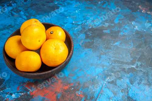 Preview: front view fresh tangerines inside plate on blue background fruit tree color photo juice citrus