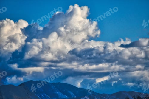 Preview: Blue skies with large fluffy cumulus clouds