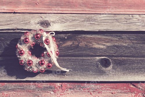 Preview: Christmas Wreath with Red Ornaments on Wooden Wall