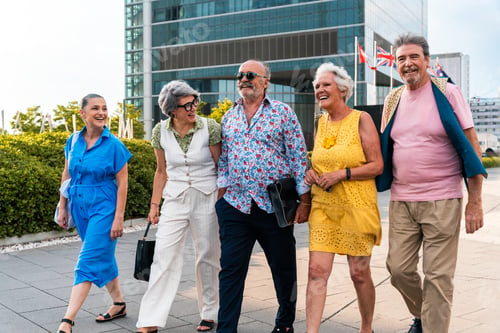 Preview: Group of senior friends meeting outddors in the city and having fun