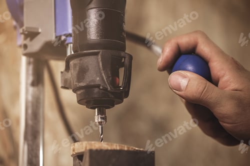 Preview: Carpenter is working on the drill machine