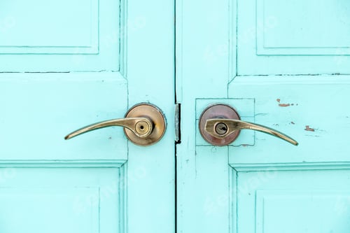 Preview: close up Brass door handle at wood blue door