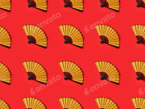 Preview: top view of decorative oriental fans pattern isolated on red
