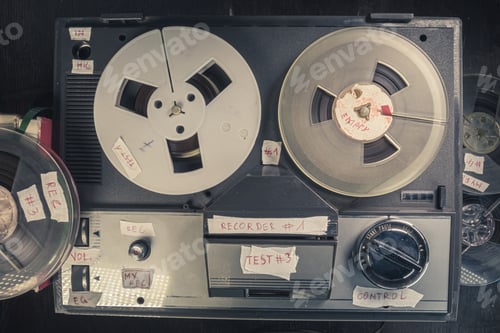 Preview: Vintage reel audio recorder and tape rolls. Audio reel player.