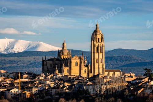 Preview: Breathtaking view of Segovia cathedral and cityscape with Guadarrama mountains.