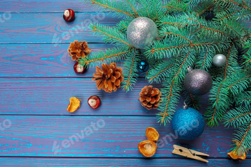 Preview: Christmas decoration, gift box and pine tree branches on wooden background