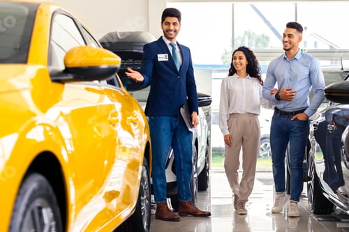 Preview: Wealthy middle-eastern couple having conversation with sales assistant