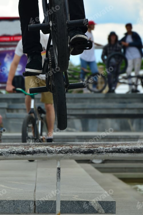 Preview: A cyclist jumps over a pipe on a BMX bike