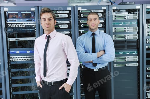 Preview: Group Of Young Business People It Engineer In Network Server Room Solving Problems And Give Help