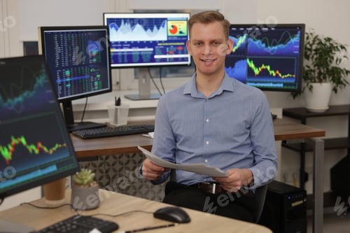 Preview: Stock exchange. Man working at desk in office