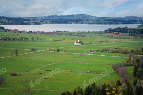 Preview: Aerial view of Schwangau valley with St Coloman Church and Forggensee - Schwangau, Bavaria, Germany