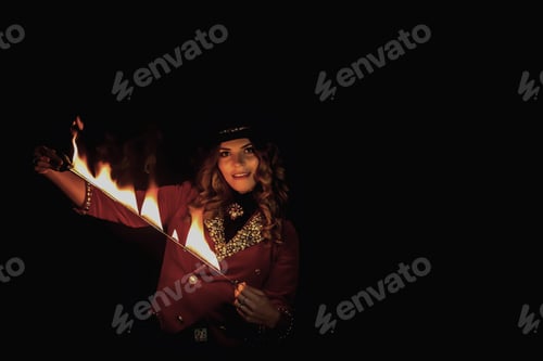 Preview: Magician woman presenting fire show, an illusionist in circus clothes
