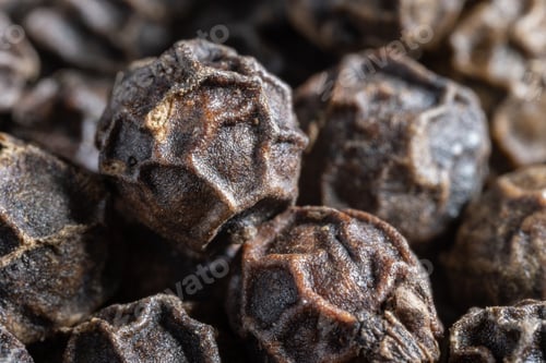 Preview: Peppercorns or black pepper spice. Super Macro Close Up.