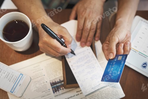Preview: Senior Couple Paying Bill Concept
