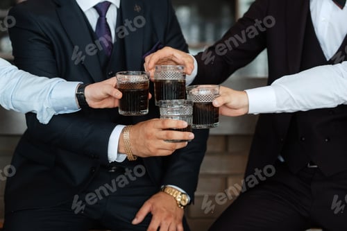 Preview: groom in a brown suit and his friends
