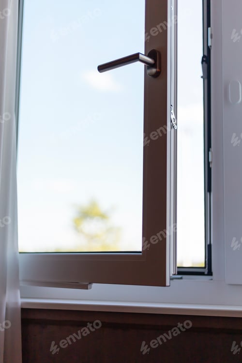 Preview: A window is open, allowing sunlight to stream into the room