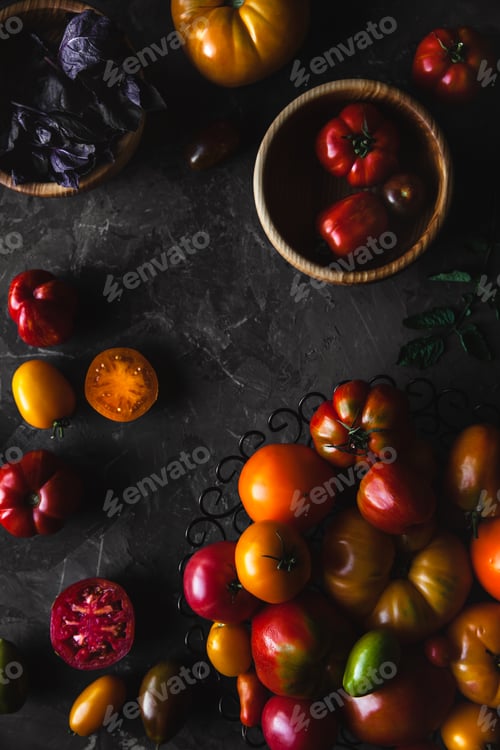 Preview: Composition with delicious tomatoes, wooden board and products on grey background, healthy food