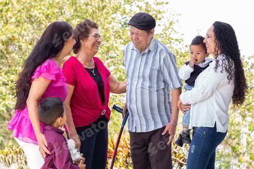 Preview: Multigenerational family enjoying a joyful moment of laughter. Active aging and family unity.