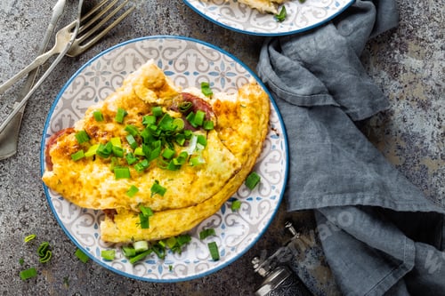Preview: Omelet or omelette with fresh green onion, scrambled eggs