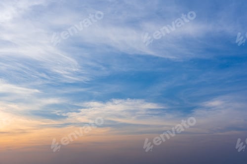 Preview: Dramatic cloudy sky and bright sunrise or sunset over the horizon. Natural skyscape background