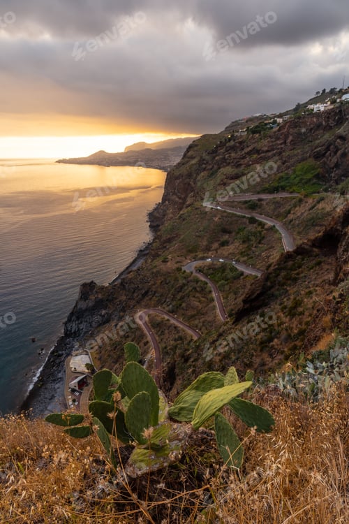 Preview: Winding road at Mirador de Cristo Rei at sunset in Funchal in summer, Madeira