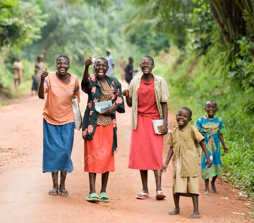 Preview: Joyful group walking down a rural path