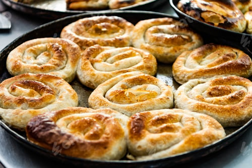 Preview: Closeup shot of homemade burek placed on the plate