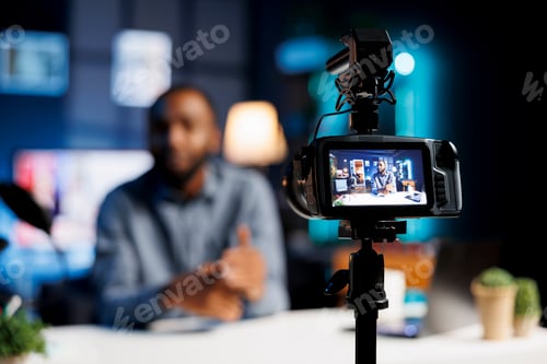 Preview: Man Recording Video for Blog in His Home