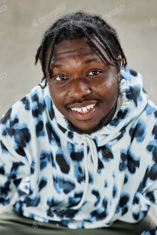 Preview: Portrait of young black man wearing hoodie