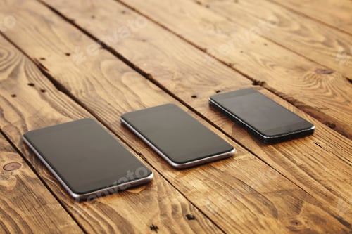Preview: Different generations of modern smartphones isolated