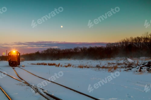 Preview: freight train travels through the vast expanses of snow-covered